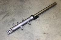 Амортизатор передний левый